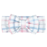 Flat lay image of a Playful Plaid luxe bow headband
