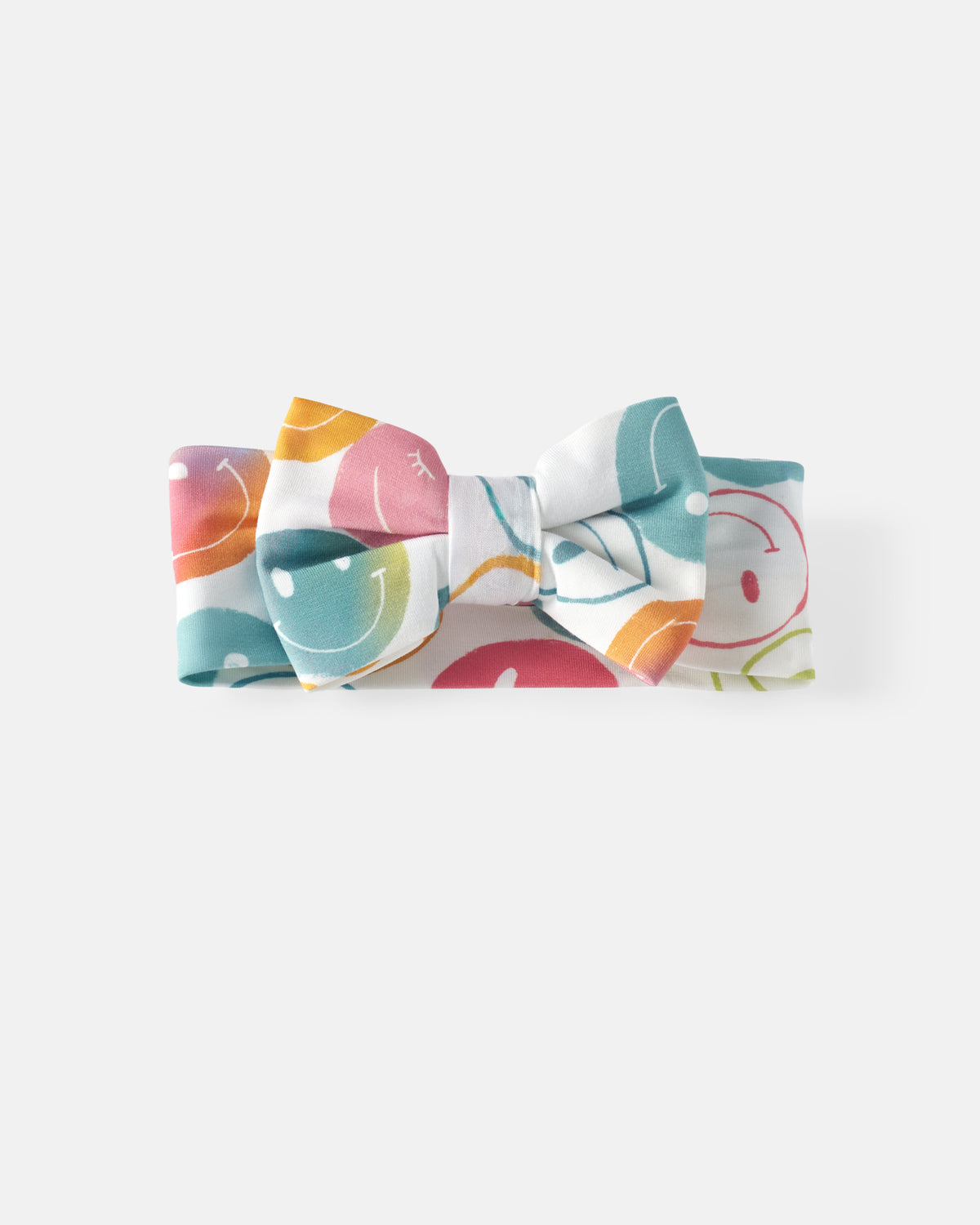 Flat lay of the Positive Vibes Luxe Bow Headband