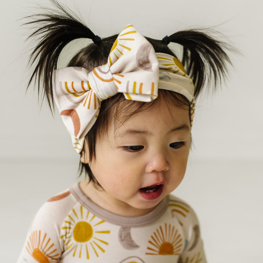 Alternate image of a child wearing a Desert Sunrise luxe bow headband