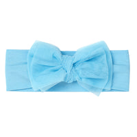 Flat lay image of a Blue tulle luxe bow headband
