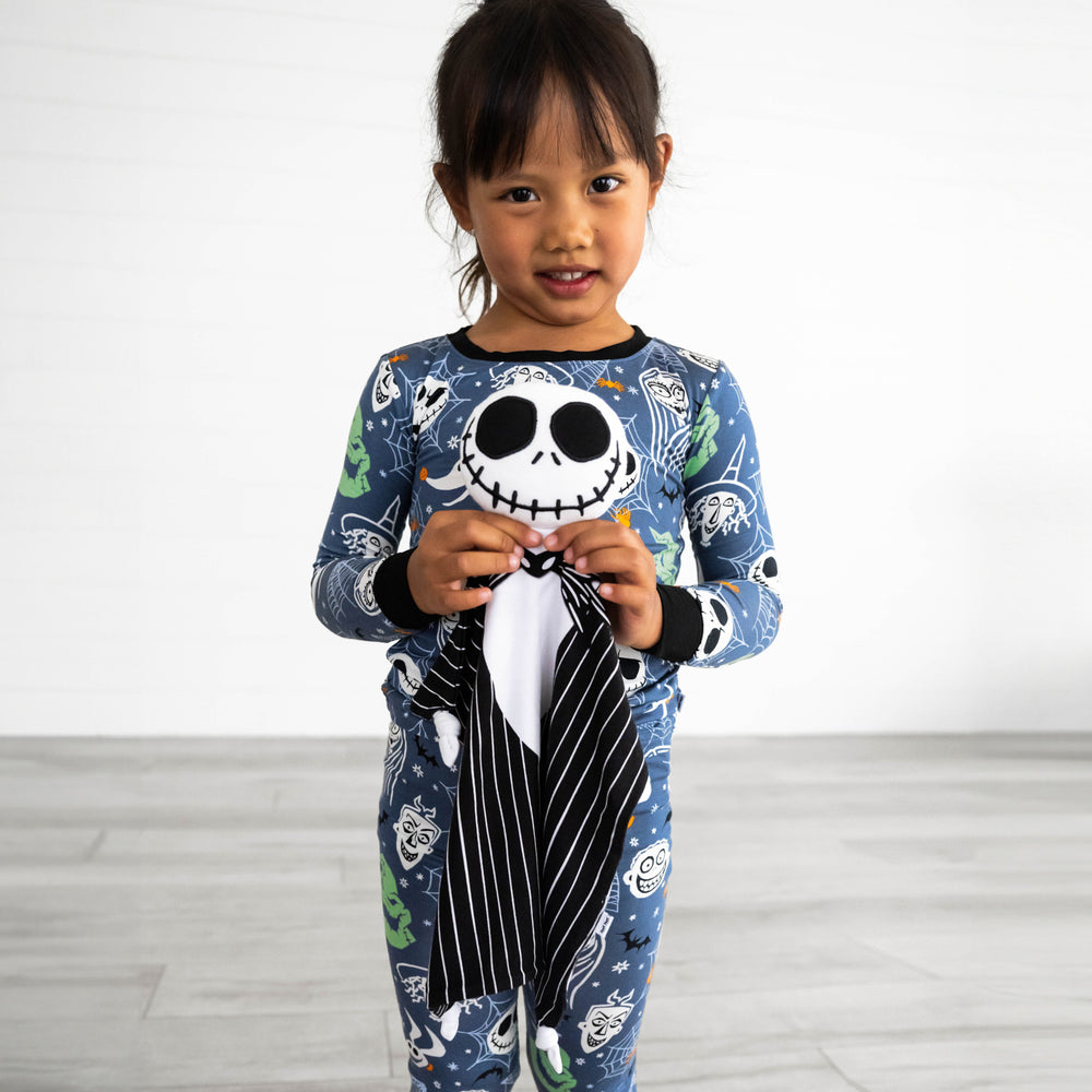 Girl holding the Disney Jack Skellington Lovey