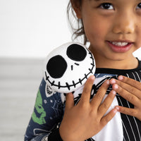 Alternative close up image of girl holding the Disney Jack Skellington Lovey