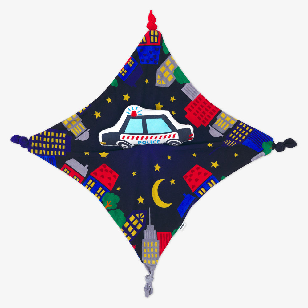 Alternate flat lay image of a Polly the Police Car sleepyhead lovey