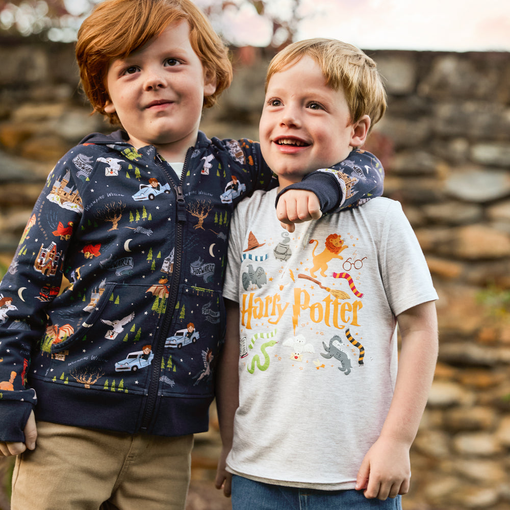 Image of two children wearing Harry Potter Play clothes