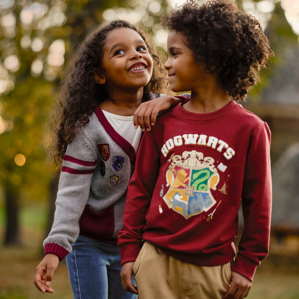 Image of two children wearing Harry Potter Play clothes