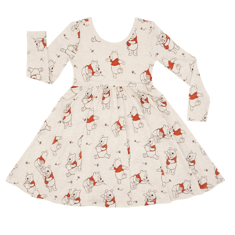 Click to see full screen - Flat lay image of a Disney Winnie the Pooh twirl dress