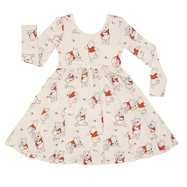 Flat lay image of a Disney Winnie the Pooh twirl dress