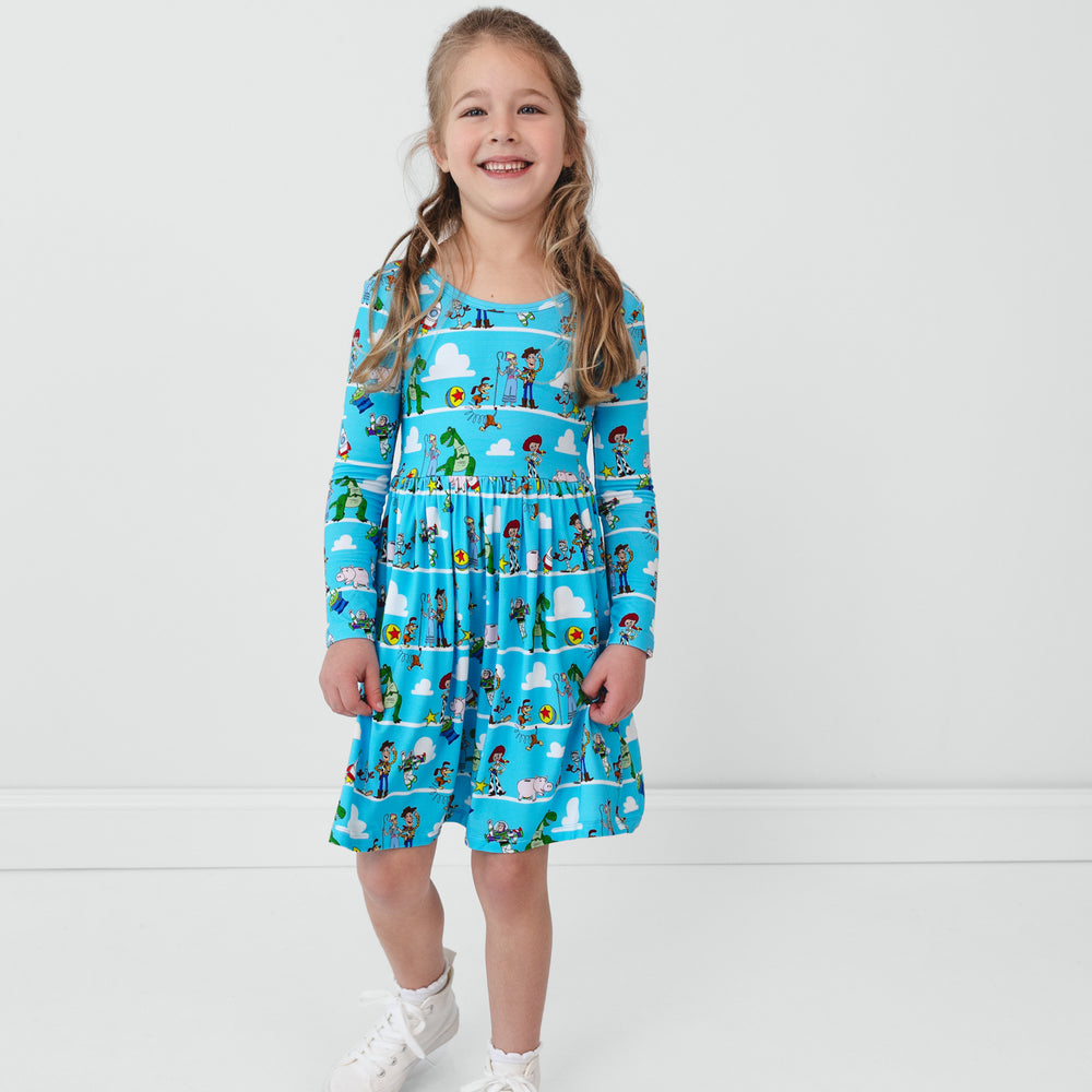 Child wearing a Disney & Pixar Toy Story Pals Skater Dress