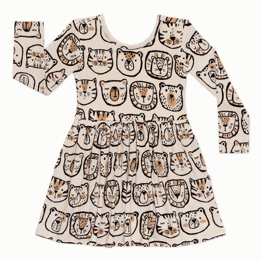 Flat lay of a Lions, Tigers & Bears long sleeve skater dress featuring black and tan animal illustrations on a tan background