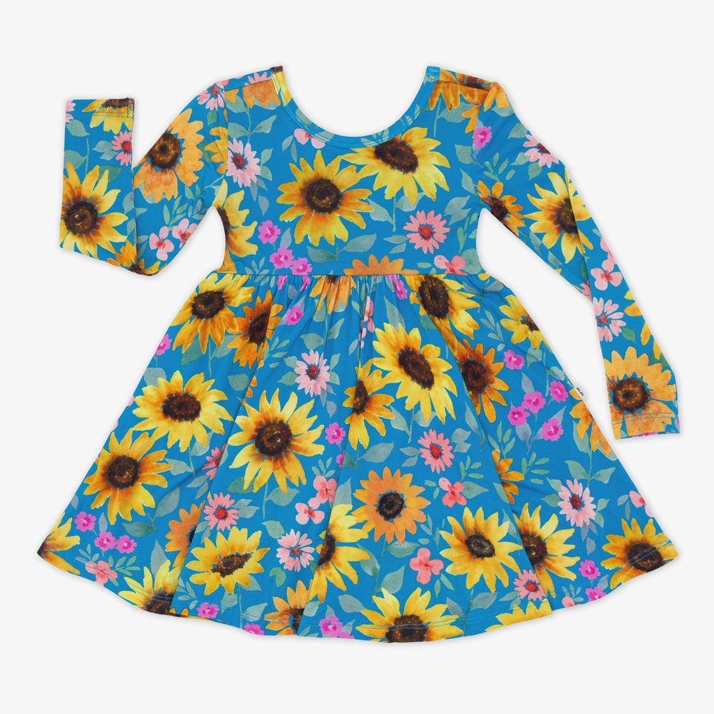 Flat lay image of a Sunflower Fields Twirl Dress