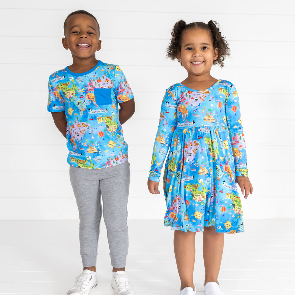 Image of two children wearing coordinating Around The World outfits