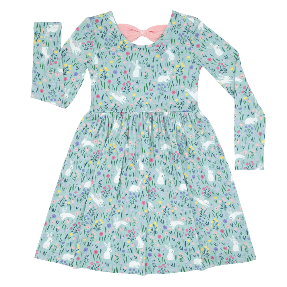 Click to see full screen - Flat lay image of a Bunny Blossom bow back skater dress