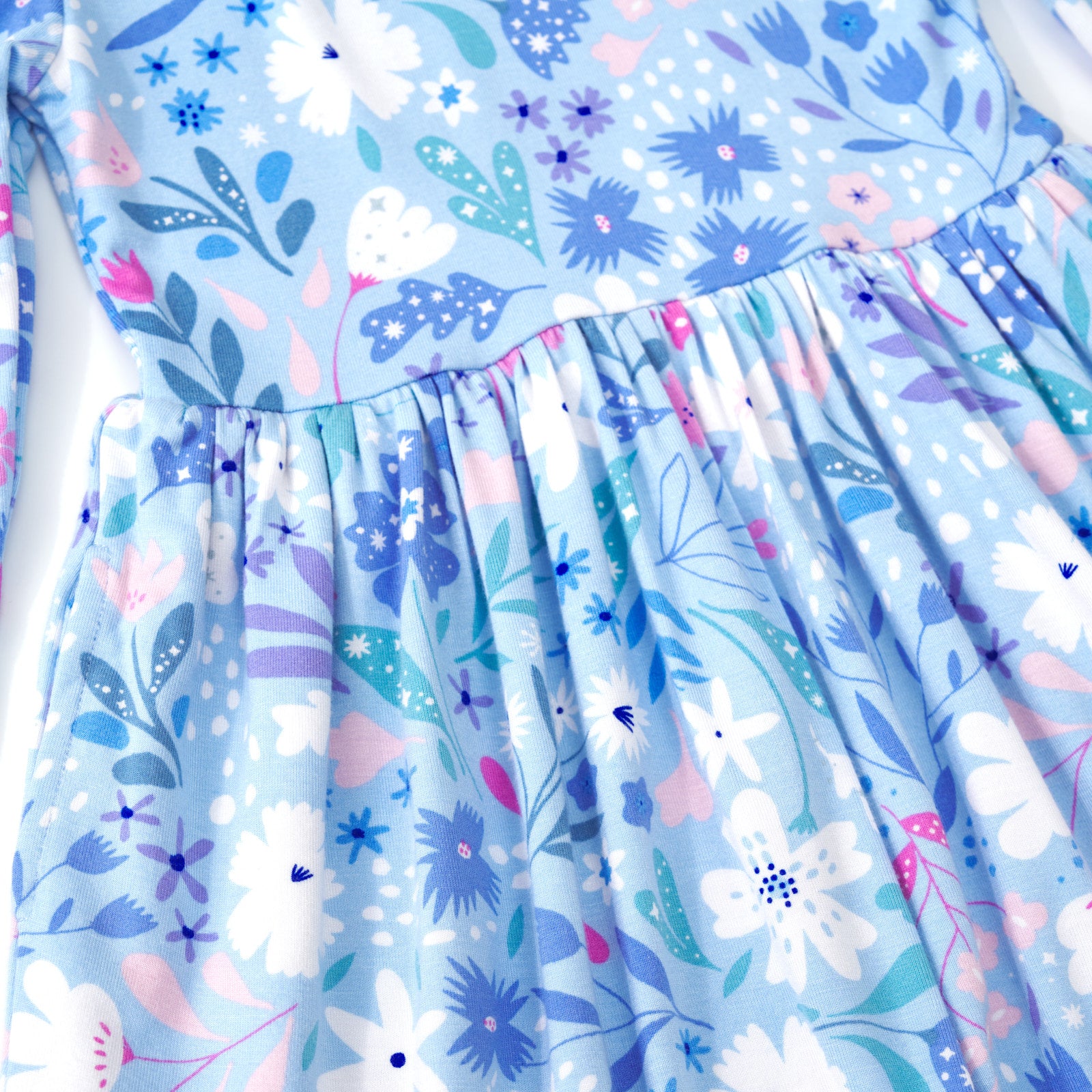 Alternate close up detail shot of the Magical Meadow Bow Back Skater Dress