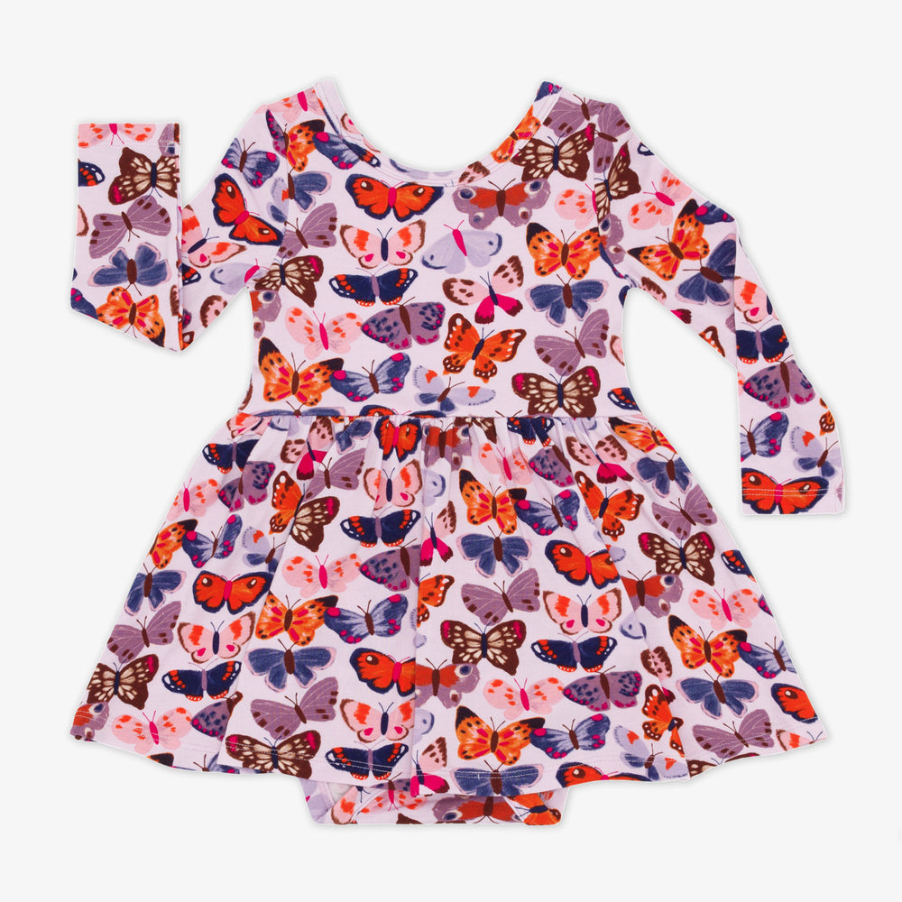 Flat lay image of the Butterfly Kisses Twirl Dress with Bodysuit