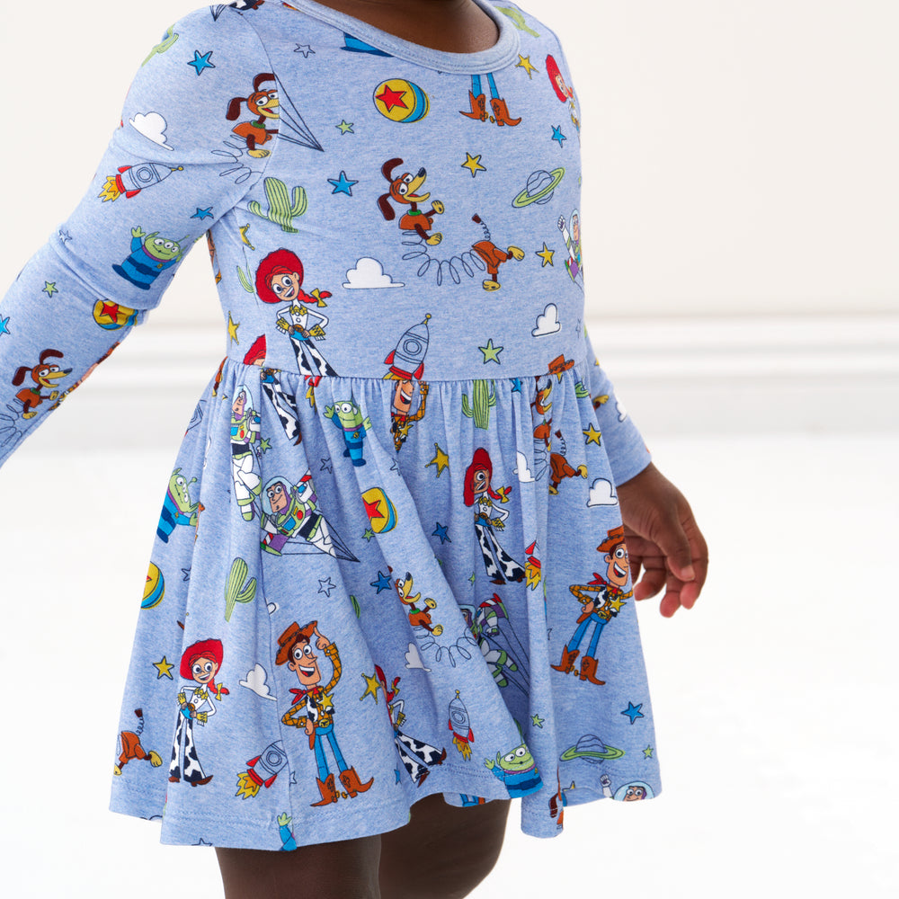 Click to see full screen - Close up image of a child wearing a Disney Pixar Toy Story Pals twirl dress with bodysuit