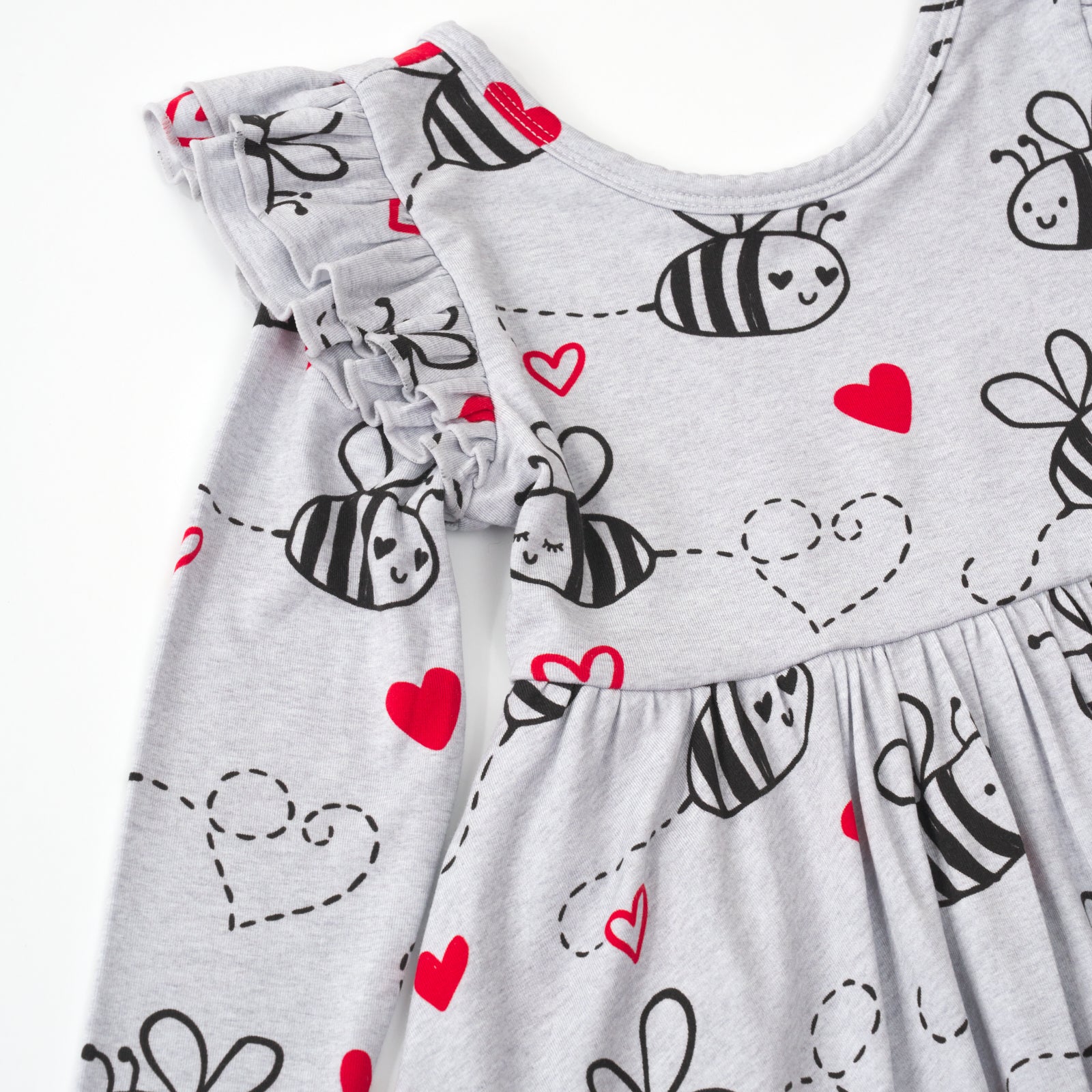 close up flat lay of a bee mine flutter twirl dress