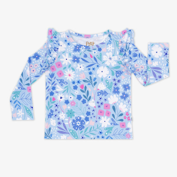 Flat lay image of the Magical Meadow Flutter Tee