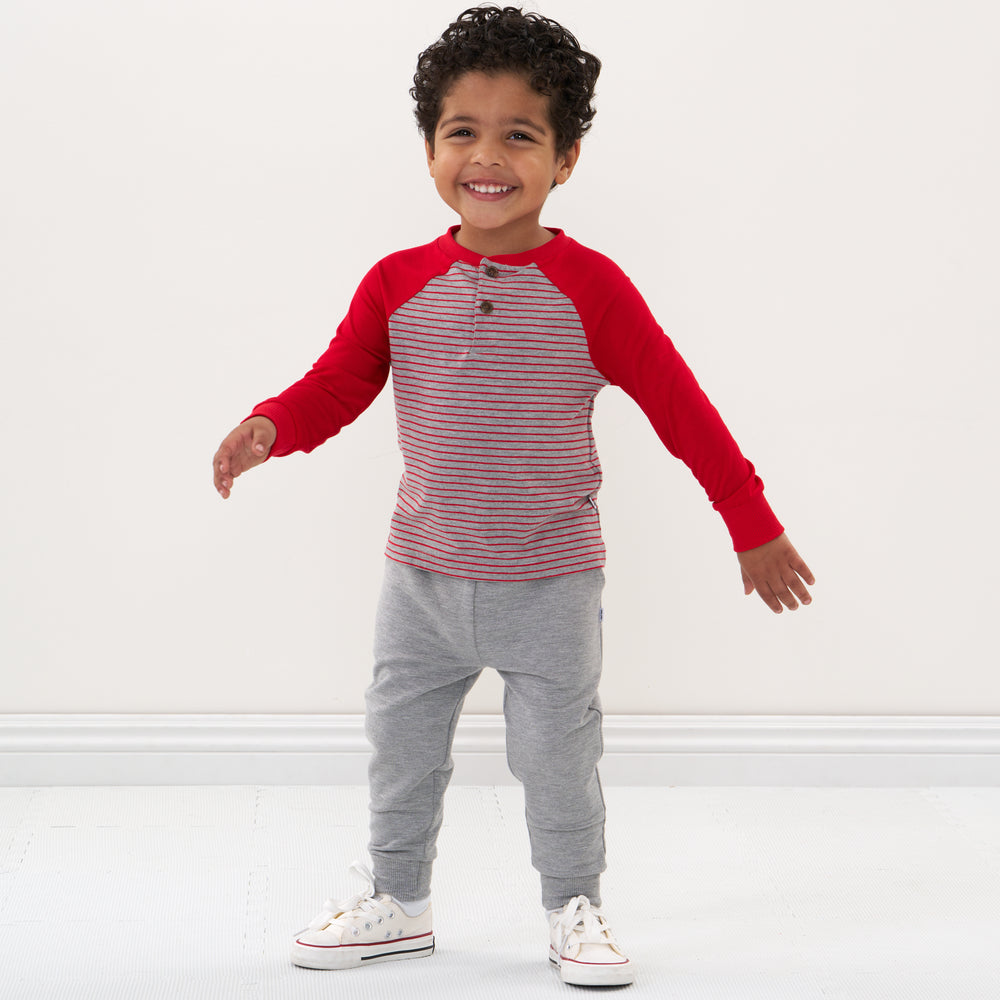 Click to see full screen - Alternate image of a child wearing a Heather Gray Stripes raglan henley tee and coordinating joggers