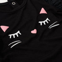 Close up image of the graphic on the Black Cat Graphic Flutter Bodysuit