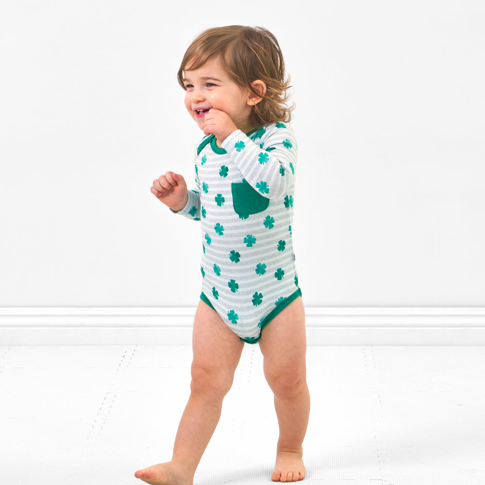 Click to see full screen - Alternate image of a child wearing a Lucky Stripes pocket bodysuit