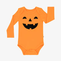 Flat lay image of the jack-o-lantern-graphic-bodysuit