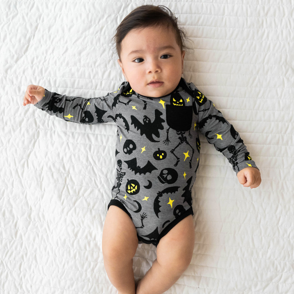 Alternative top view image of baby wearing the Gray Glowing Ghouls Pocket Bodysuit