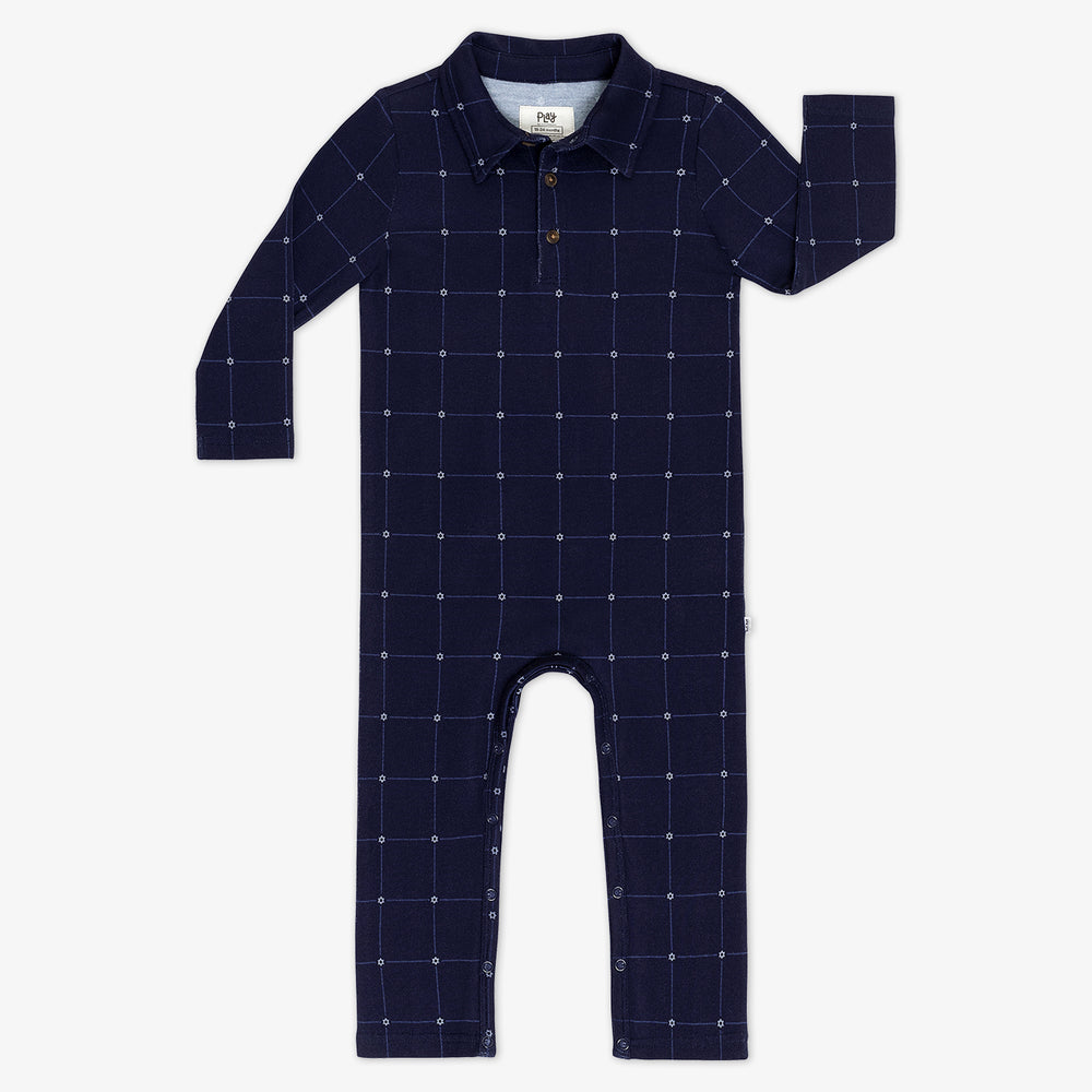 Flat lay image of a Hanukkah Stars Plaid Polo Romper