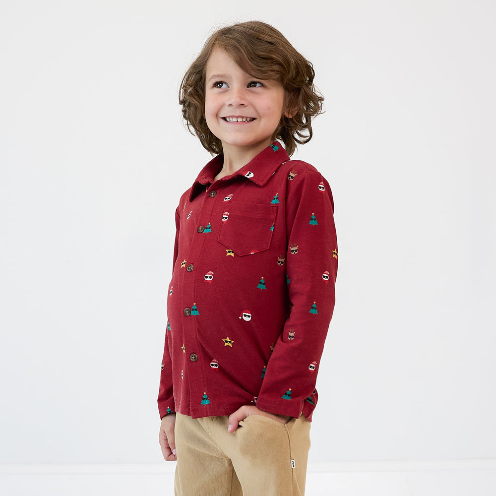 Close up image of a child wearing a Cool Christmas Button Down Shirt and Toasted Hazelnut Denim Jogger