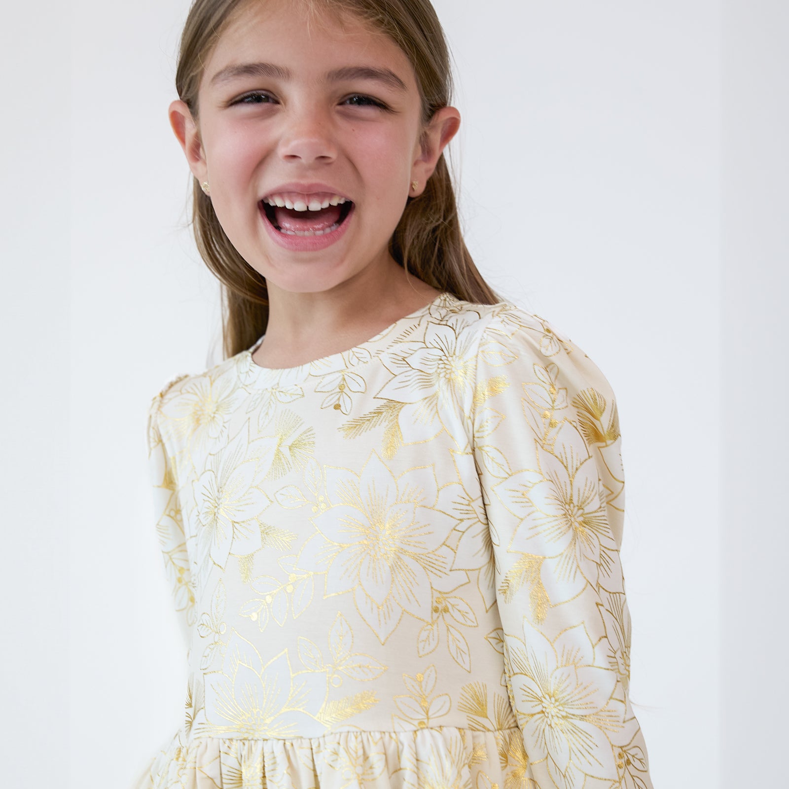 Alternate close up image of a child wearing a Golden Blooms Tiered Peplum Top