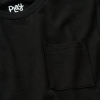 Close up image of the pocket detail on the Black Long Sleeve Relaxed Pocket Tee