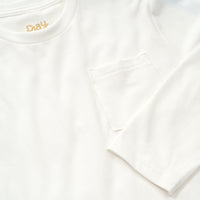 Close up image of the collar, sleeve and pocket detail on the Soft White Long Sleeve Relaxed Pocket Tee