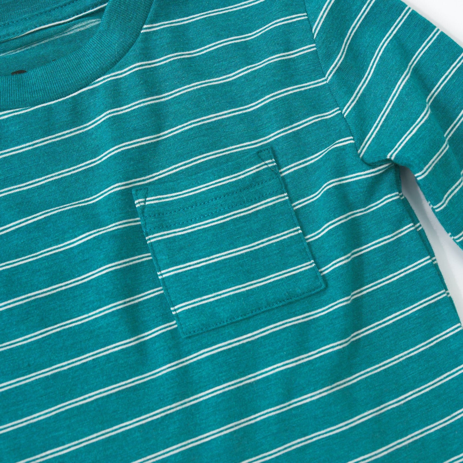 Close up detail shot of the Glacier Stripes Relaxed Pocket Tee