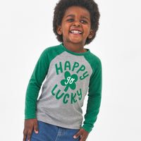 Alternate image of a child wearing a Happy Go Lucky raglan tee