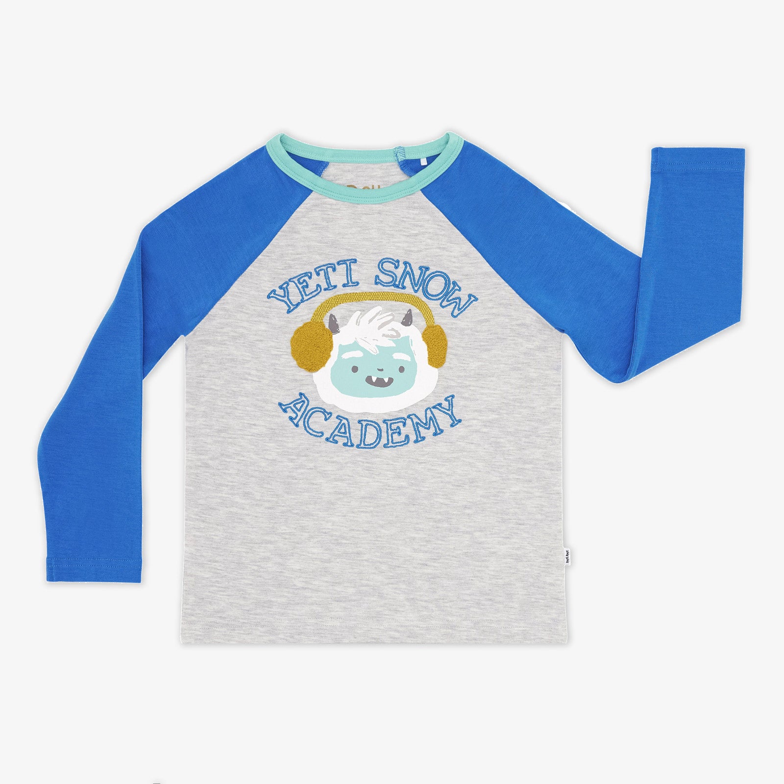 Flat lay image of the Yeti Snow Academy Raglan Tee