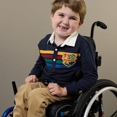 Image of a child in a wheelchair wearing a Harry Potter Rugby Shirt