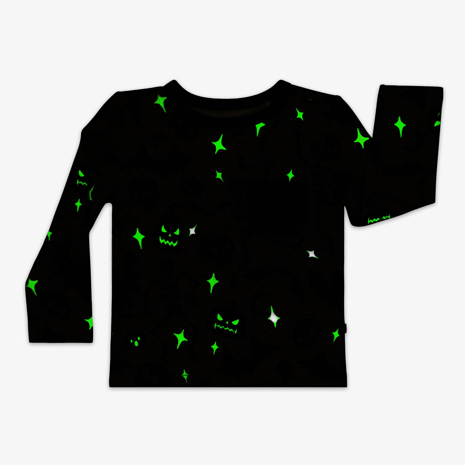 flatlay image showing glow in the dark details on glowing ghouls tee shirt