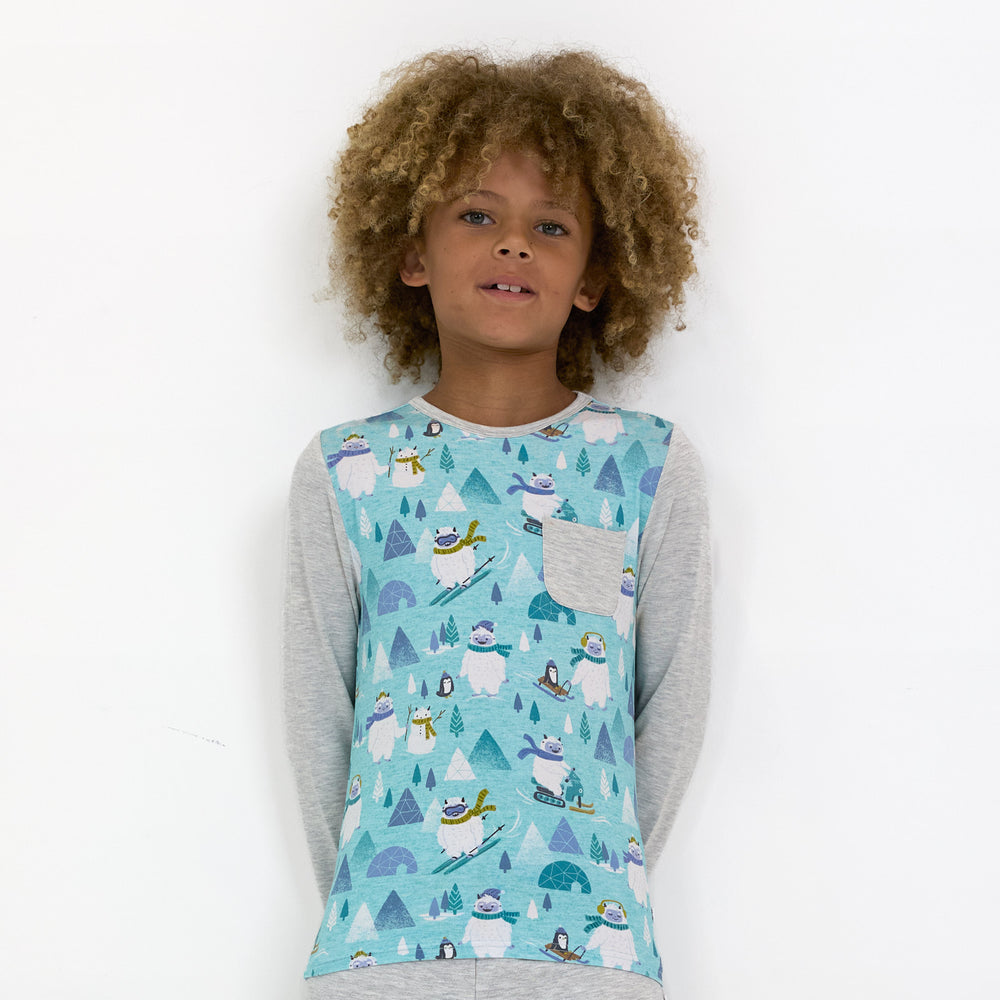 Child wearing the Yeti Snow Day Raglan Pocket Tee