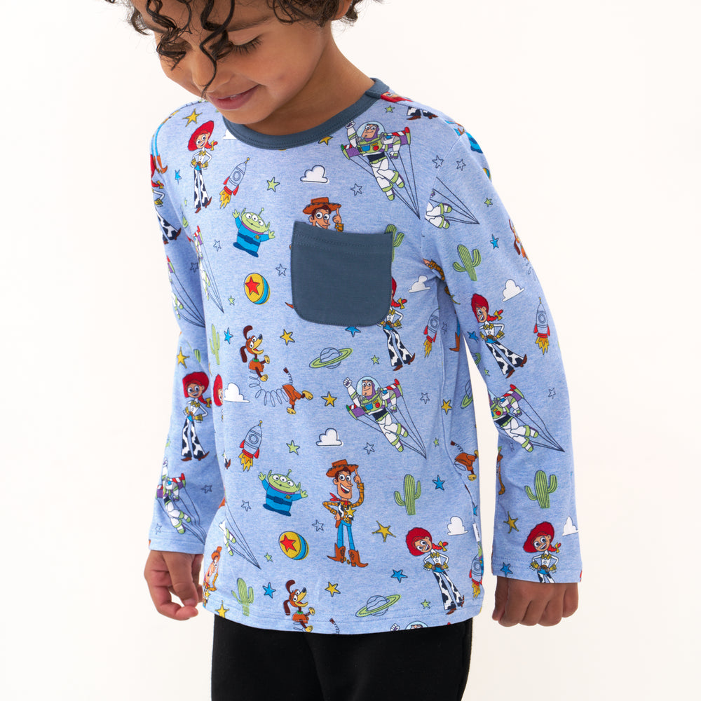 Click to see full screen - Close up image of a child wearing a Disney Pixar Toy Story Pals pocket tee