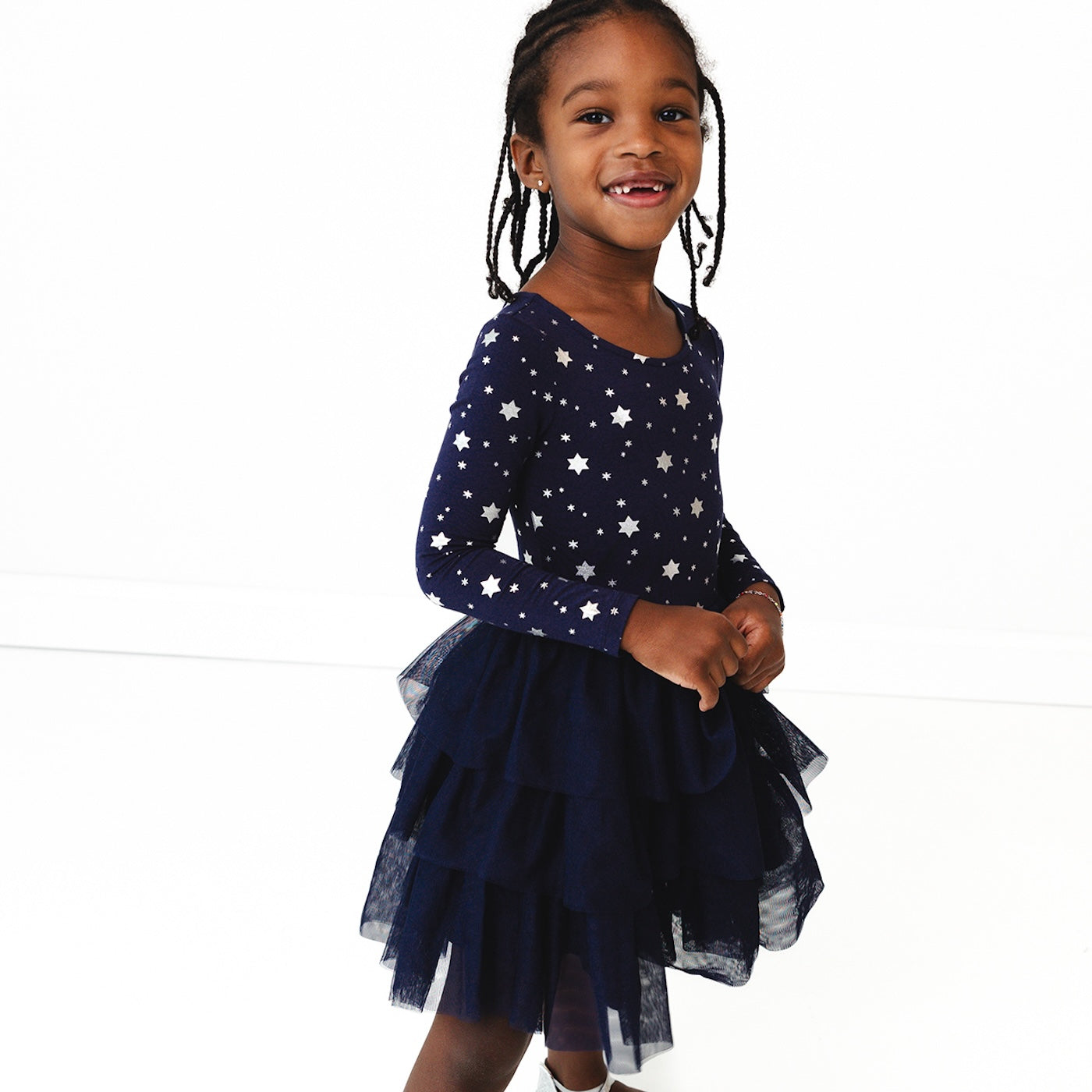 Child wearing a Hanukkah Stars Tiered Tutu Dress