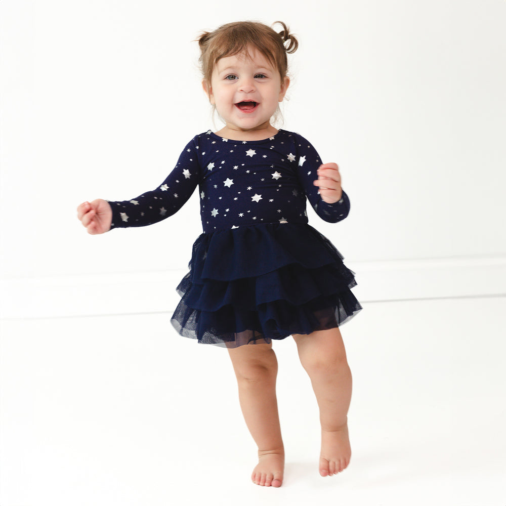 Child wearing a Hanukkah Stars Tiered Tutu Dress with Bloomer