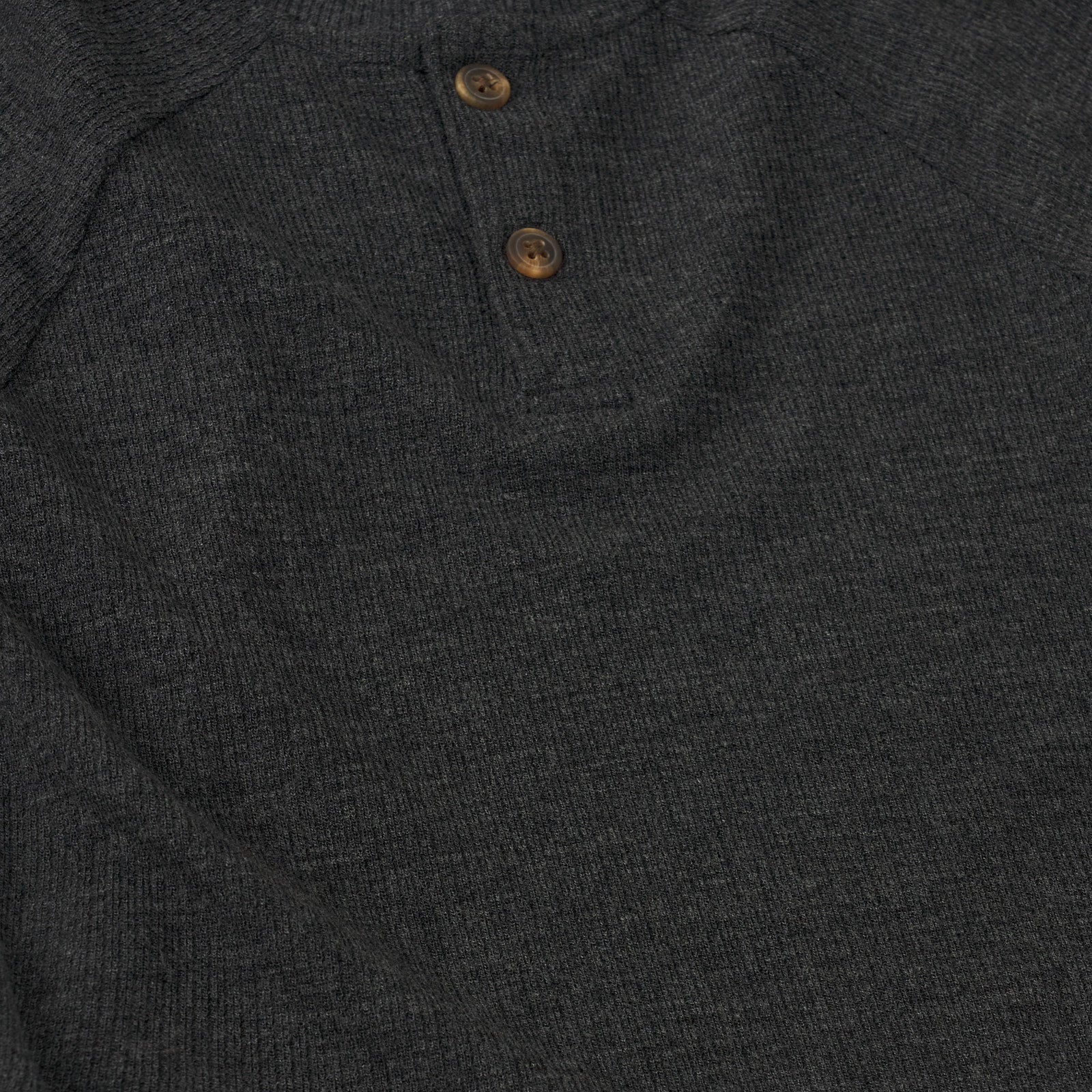 Alternate close up detail shot of a Heather Black Waffle Henley Tee