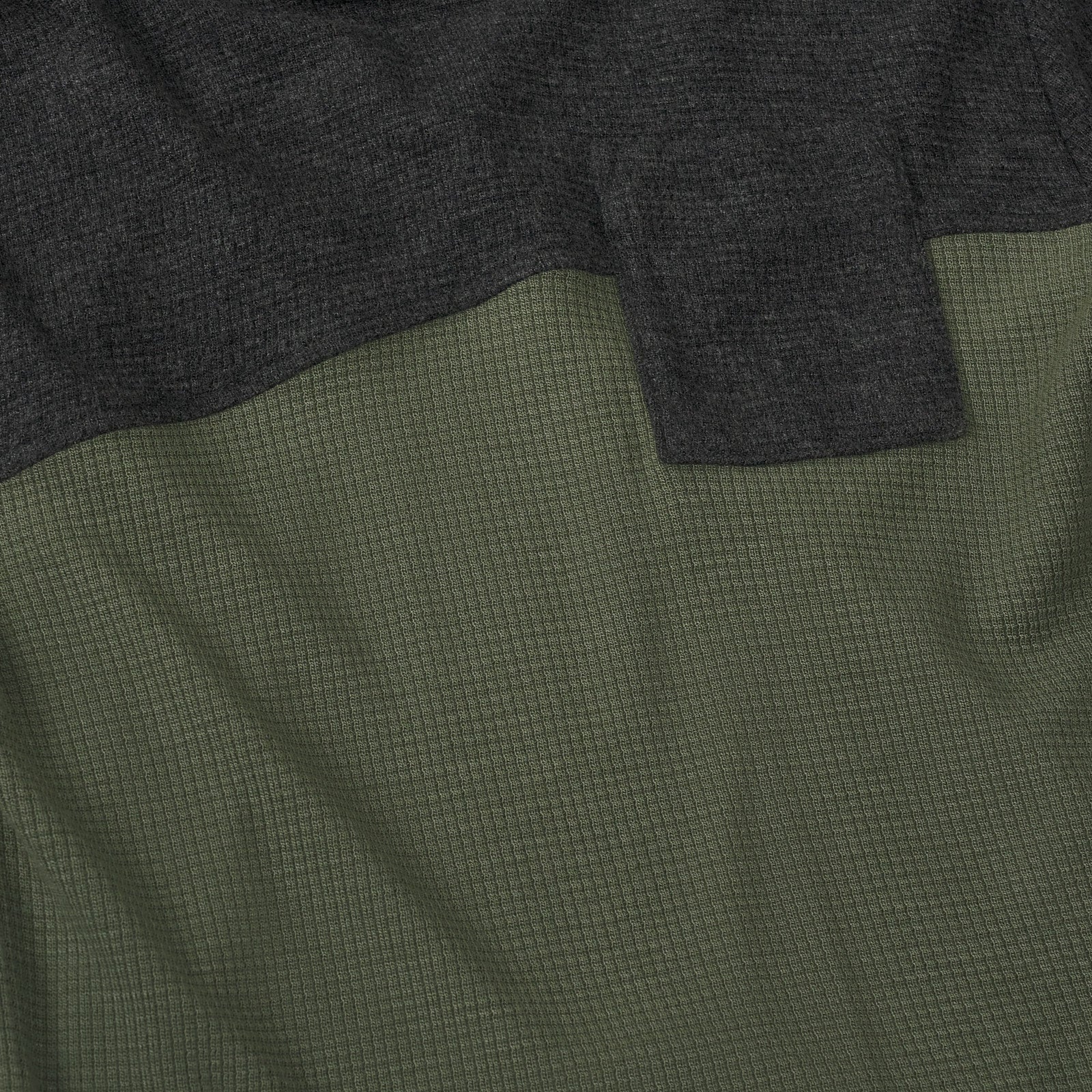 Alternate close up detail shot of a Heather Black Waffle Hooded Tee