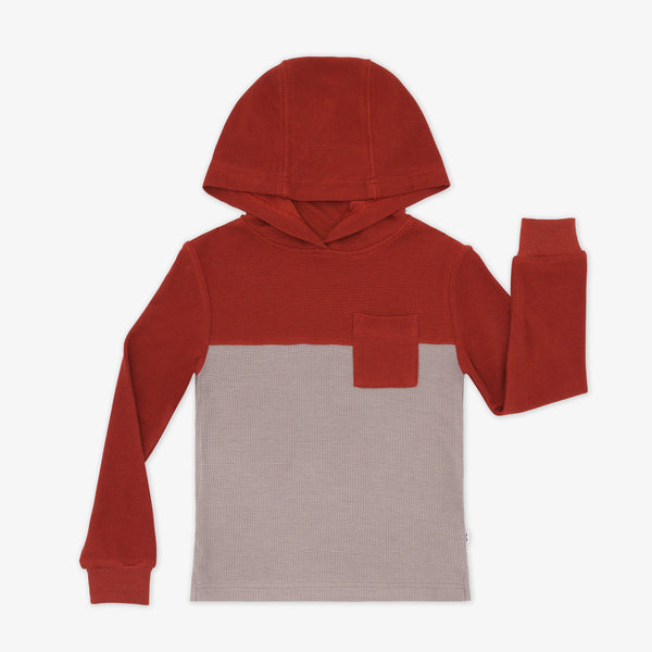 Flat lay image of a Rust Waffle Hooded Tee