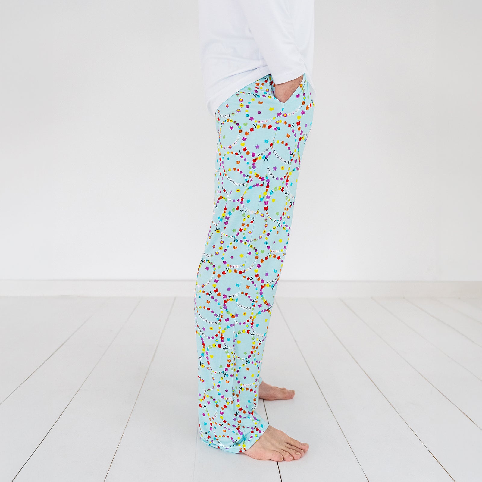 Side view image of a man wearing the Friends Forever Men's Pajama Pants