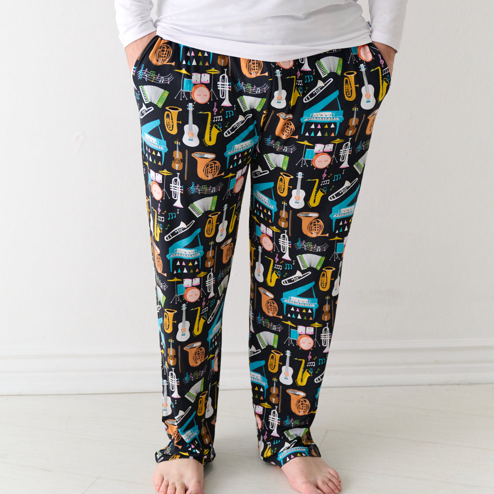 Close up image of a man wearing Keys and Chords men's pajama pants