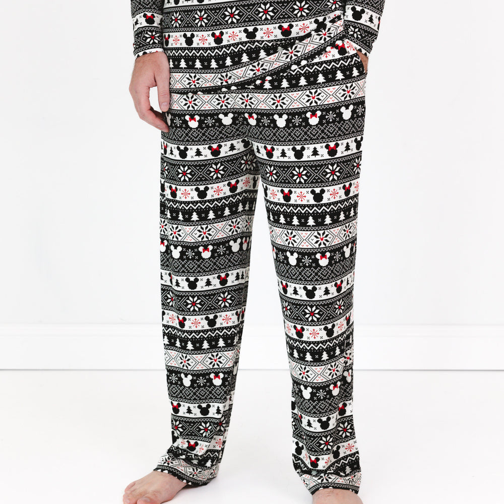 Close up image of a man wearing Mickey Fair Isle men's pj pants