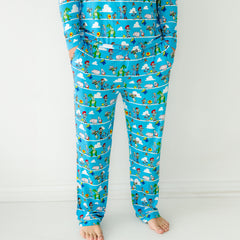 Close up image of a man wearing Disney Pixar Toy Story Pals men's pajama pants and matching pajama top