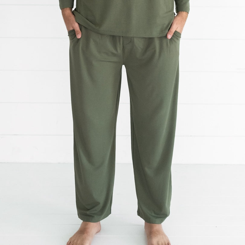 Close up image of man wearing Cozy Olive men's pj pants