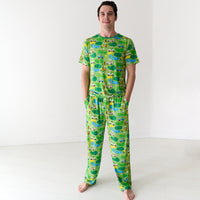 Man wearing Fairway Fun men's pajama pants and matching short sleeve pajama top