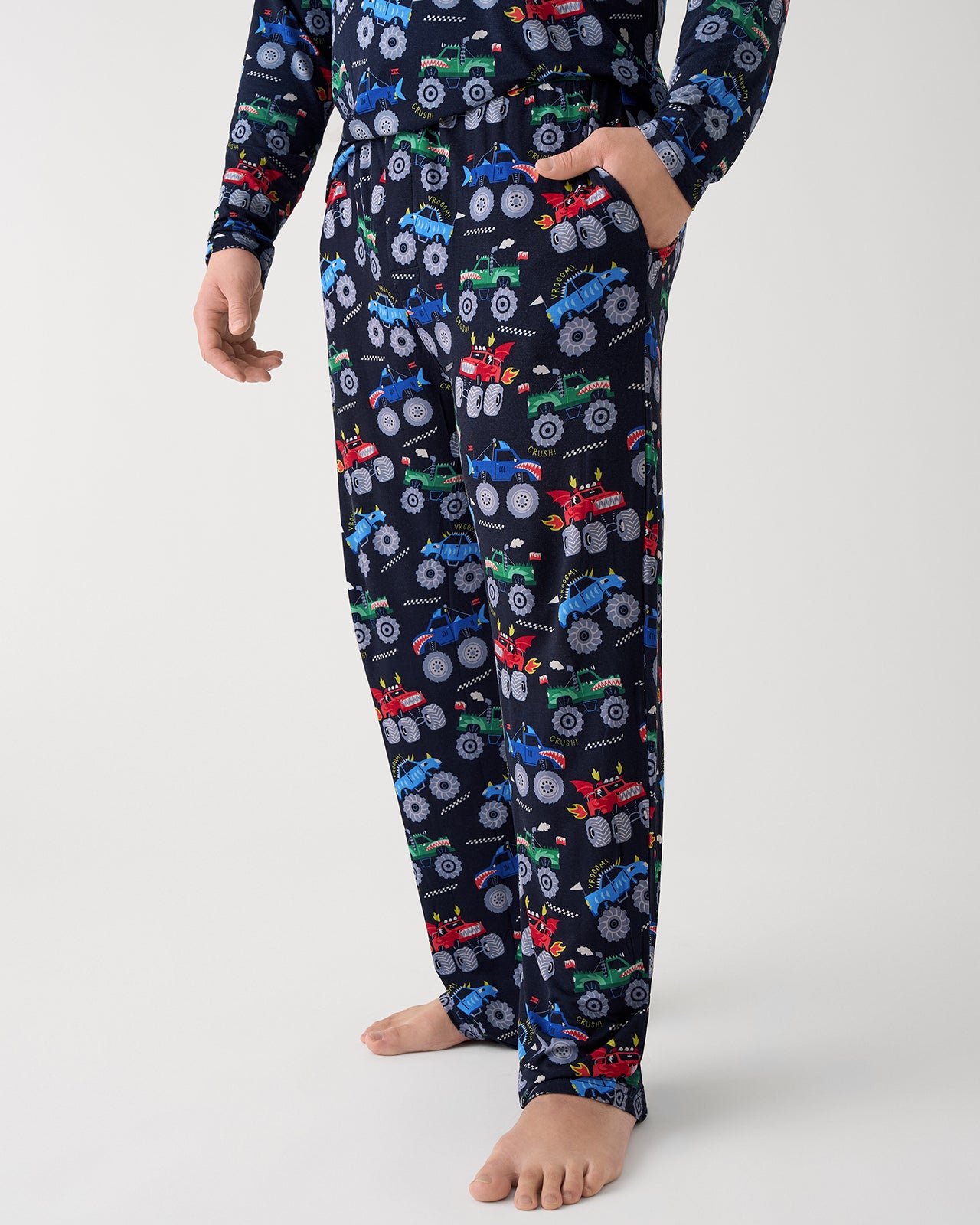 Man wearing the Monster Truck Madness Men's Pajama Pants